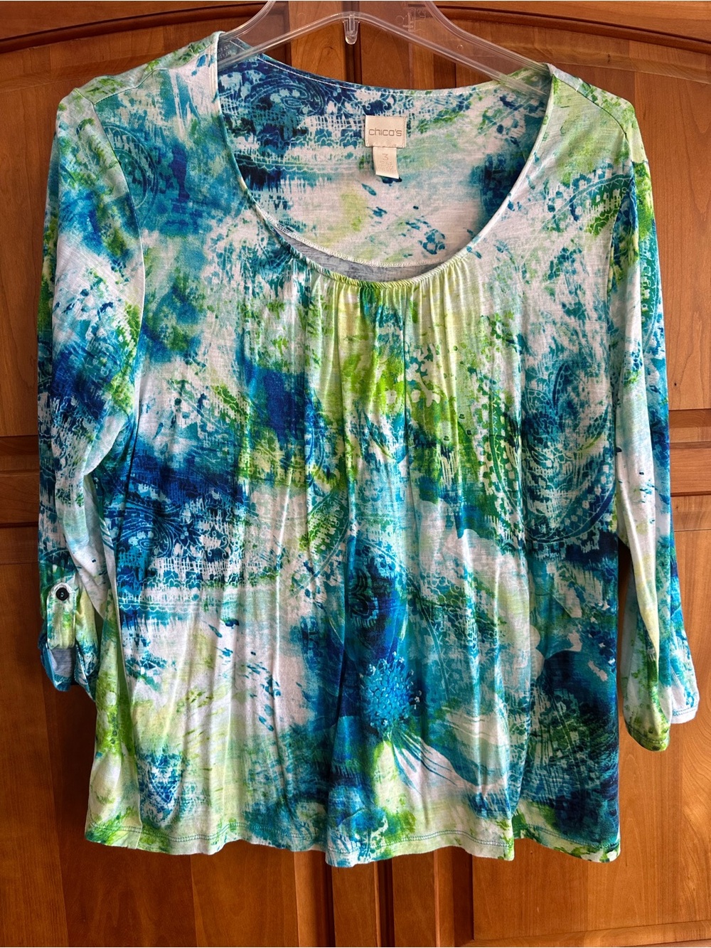 Chicos Colorful Floatie Popover Top, their size 3, P-T-P is 26” across. NWOT,